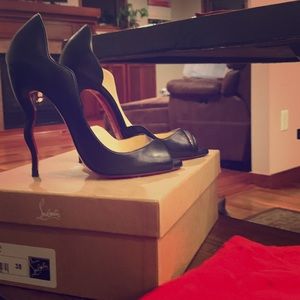 Authentic Christian Louboutin Squiggle heel